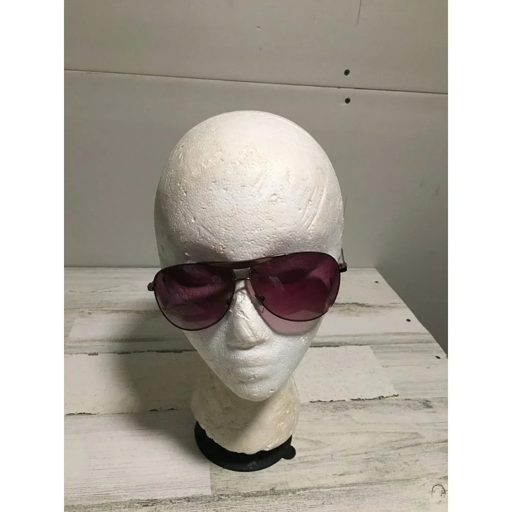 Fossil unisex aviator sunglasses with dark brown lenses and bronze frames